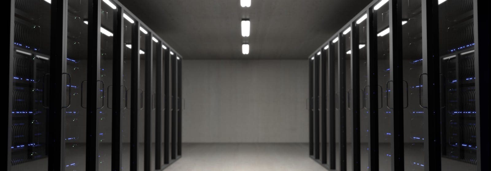 Data center server racks representing website hosting infrastructure speed security and cost tradeoffs